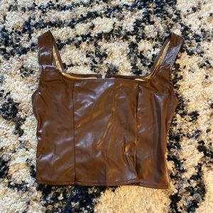 Brown leather crop top.